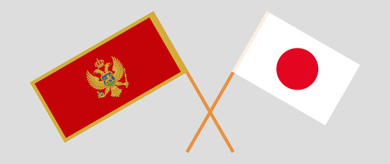 Crossed flags of Montenegro and Japan. Official colors. Correct proportion