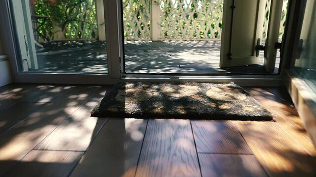 Wooden floor. The wooden floor in the room is illuminated by the rays of the sun.