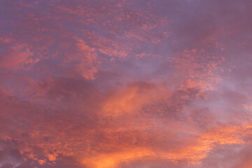Naklejka na ściany i meble Epic dramatic sunrise, sunset pink violet orange blue sky with clouds background texture 