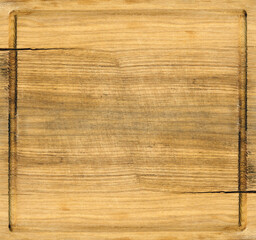 Top view of the old scratched wooden desk as a background