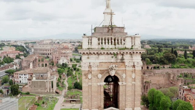 Drone view of Capitolium or Campidoglio, seat of the City Council of Rome, with the statue of Marcus Aurelius and Colosseo or Coliseum and Roman Forum in the background. Landmarks in Rome, Italy
