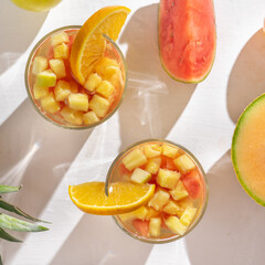 Sangria cocktail with white wine and fresh fruit
