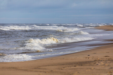 crashing waves of The the Atlantic  ocean on the beach Cape Cod, Massachussets
