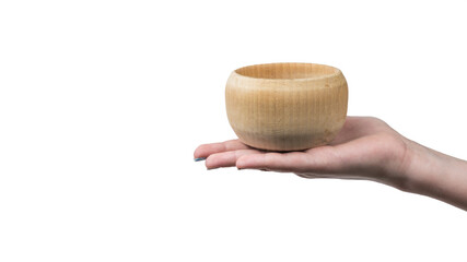 Female hand with wooden bowl isolated on white background.