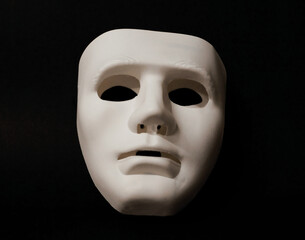 Theatrical mask set at an angle to give the viewer an impression of eye movement.