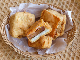 Popular Chinese New Year snacks / Deep Fried Nian Gao  with Sweet Potato & Yam / A delicacy usually eaten during the festival but with modern trend it's now available all year round, a must try snack