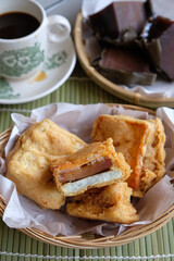 Popular Chinese New Year snacks / Deep Fried Nian Gao  with Sweet Potato & Yam / A delicacy usually eaten during the festival but with modern trend it's now available all year round, a must try snack