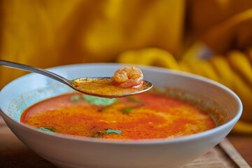 beautiful seafood soup in a white plate