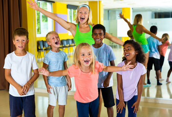 Happy children in dance studio smiling and having fun. High quality photo