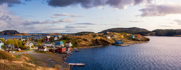 Panoramic view of a small town on the Atlantic Ocean Coast. Dramatic Colorful Sunrise Sky Art...