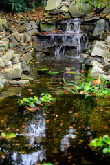 Artificial waterfall by the lake.