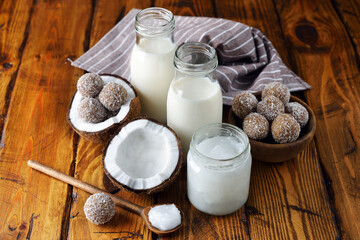 Obraz na płótnie Canvas Vegan coconut products, milk, butter and candy