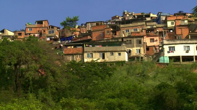 Panoramic view of a favela perched on the hilltop in Rio de Janeiro