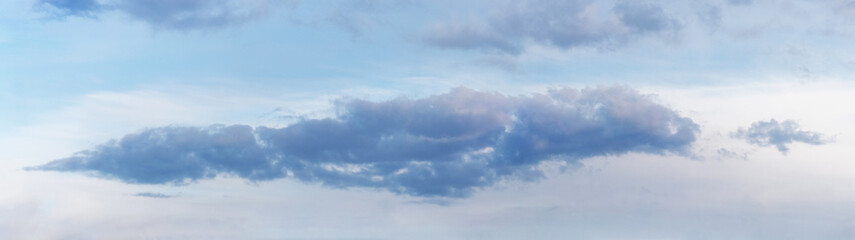 Dark blue cloud in the light sky, panorama