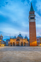 Fototapeta na wymiar St Marks square in Venice with the bell tower and the cathedral at dawn