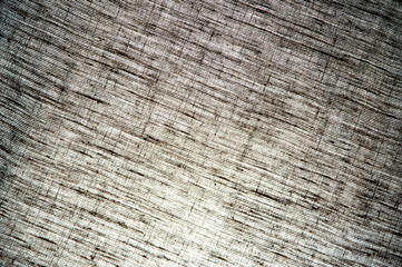 Fototapeta premium abstract rough light linen natural fabric background, short focus