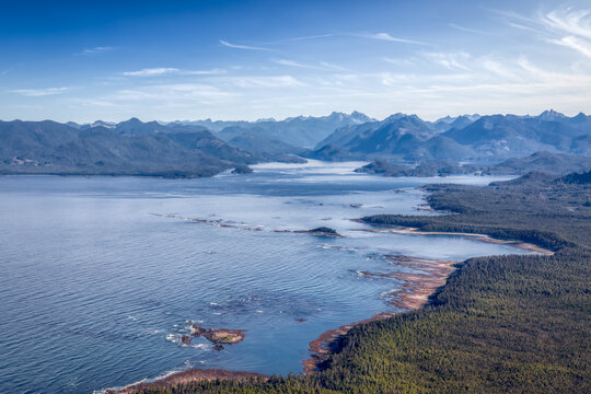 Aerial View from Airplane of Pacific Ocean West Coast. Blue Sky Art Render. Taken in Hesquiat Peninsula Provincial Park, North of Tofino, Vancouver Island, British Columbia, Canada.