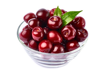 glass bowl of sweet cherry fruits isolated on white background
