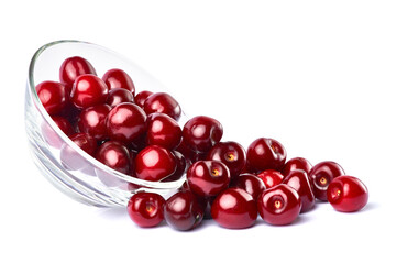glass bowl of sweet cherry fruits isolated on white background