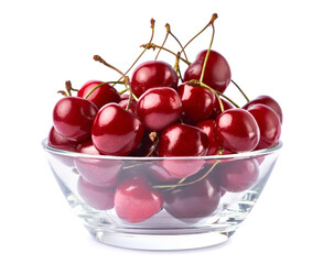 glass bowl of sweet cherry fruits isolated on white background