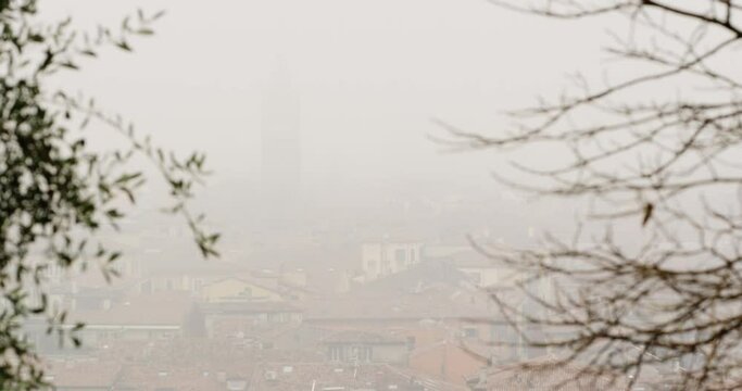 The city of Verona, Italy on a very foggy day, focus pull