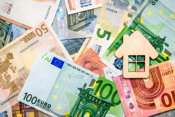 The symbol of the house stands on the background of the Euro