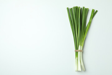 Fresh green onion on white background, space for text