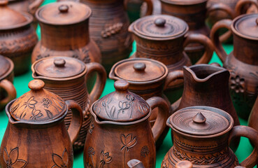 Handmade Ceramic Tableware. Clay pots for water and for storing various drinks. pots on the market, close-up