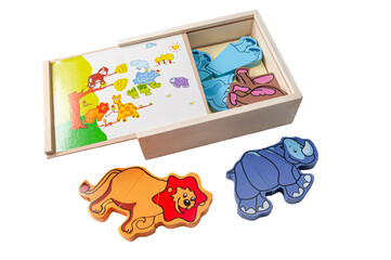 African wild animals magnetic puzzle. The box contains a set. Educational toy Montessori. White background. Close-up.