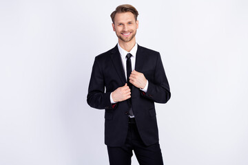 Photo of young handsome man happy positive smile confident wear suit isolated over grey color background