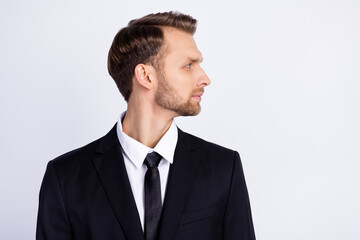 Profile side photo of young business man concentrated focused look empty space isolated over grey color background