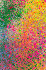 Sprinkle several colors of dust on the white paper that is spinning around until the dust is circular.