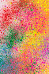 Sprinkle several colors of dust on the white paper that is spinning around until the dust is circular.