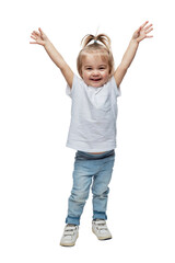 Laughing little girl hands up. Kid 2 years old in jeans and a white T-shirt. Childhood, happiness and positivity. Full height. Isolated on white background. Vertical.