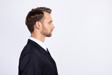 Side profile photo portrait of professional worker in blazer looking blank space isolated on white color background