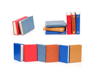 Stack of books in colour covers with white sheets isolated on a white background