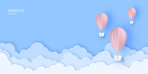 Obraz premium Pink beautiful hot air balloons flying over clouds in the sky.