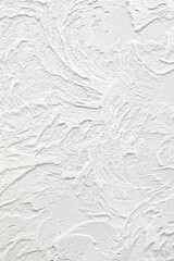 Vertical background and texture of decorative plaster to cover the walls and ceilings. White background for design and decoration. Copy space