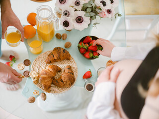 selective focus. Continental breakfast with croissants, orange juice and coffee or tea