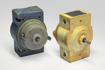two-contact model electric motor. Vintage DC motor in compact design, for toys and electronic...