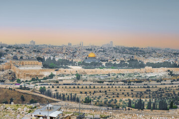 Panorama of the old city Jerusalem and monumental defensive walls. Most important world holy places