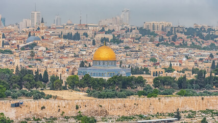 Obraz premium The old city Jerusalem and monumental defensive walls. The Dome of the Rock. Most important world holy places. Israel landmarks