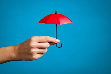 Protection with small red umbrella