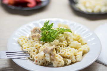 Macaroni and cheese, on the kitchen table