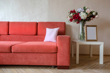 red sofa in the interior of the living room