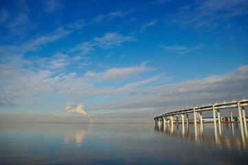 Obraz premium The overpass of the Western Expressway Diameter in St. Petersburg runs over the Neva bay, a view from the island of Canonersky