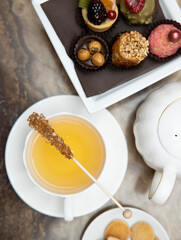 selective focus. Tea time with cake and cookies and cane sugar . Breakfast time. 