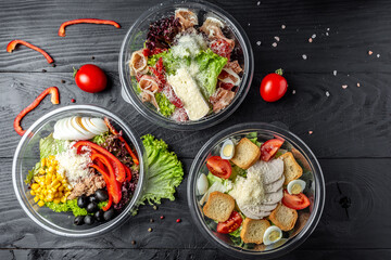 Set healthy light diet salad in plastic package for take away or food delivery. food in containers....
