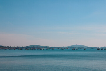High point view for looking at the location of Sattahip Naval Base with clear sky and blue sea. Sea view and the island close to Sattahip Naval Base, Thailand.