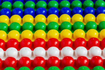 Elements of the children's constructor. Educational game. Selective focus